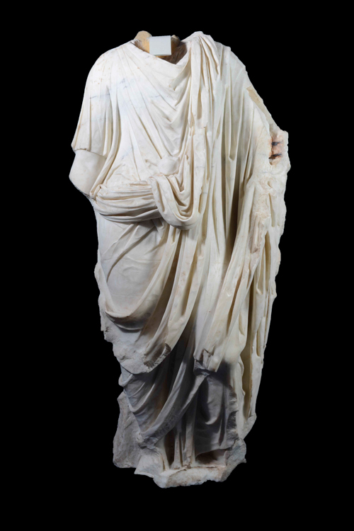 Statue of a boy in toga